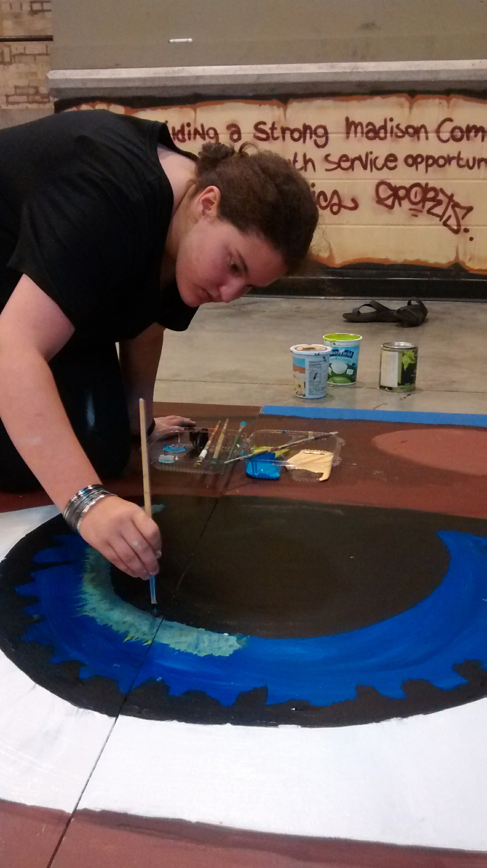 Close-Up of Detail Painting Eyes on Mural