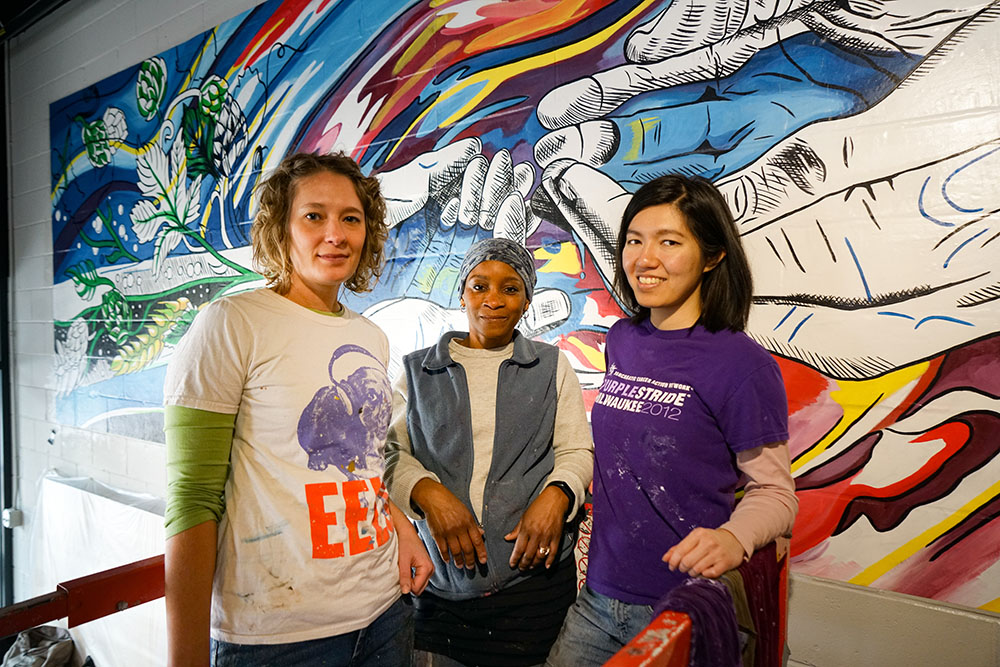 Artists in Front of Completed Mural